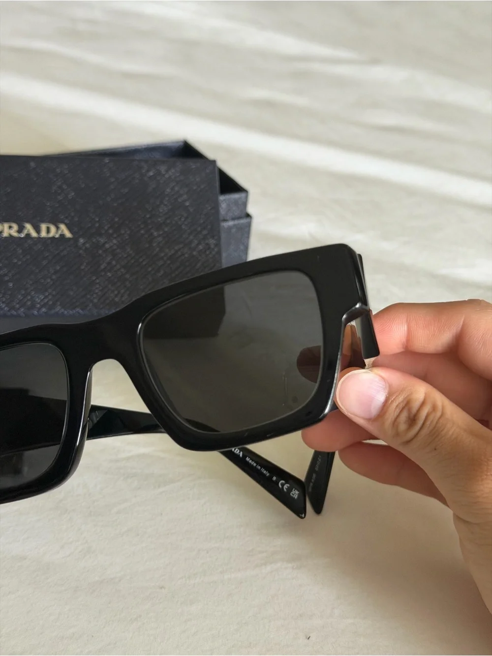 Prada signature logos